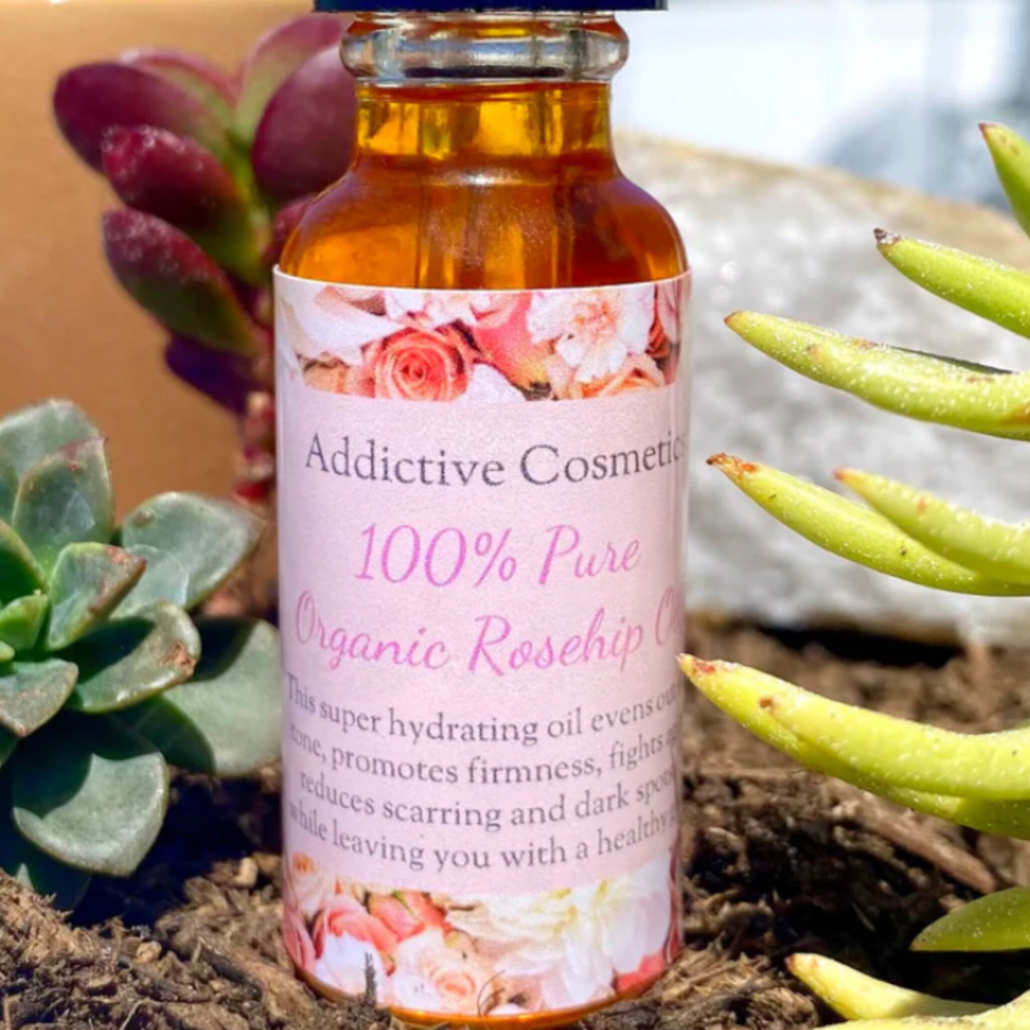 Skin care rose hip oil bottle, amber glass, floral label with text