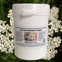 Side view of chic white yarrow cream jar with gold accents, showcasing its smooth texture and minimalist design