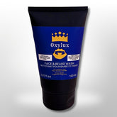 Face and beard wash tube, black and blue plastic, Oxylux branding visible