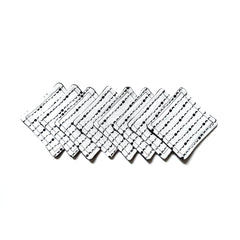 Coasters white with black pattern, square shaped, stacked on white background