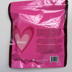 Hershey's Kisses Glamlite eyeshadow palette in pink packaging with heart design and brand text
