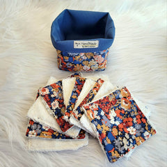 Floral fabric basket with blue lining and floral pattern washcloths with white terry cloth backing, Handmade by L&A Creation label