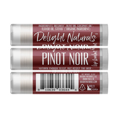 Lip balm tube with burgundy label, white text, and Delight Naturals branding.