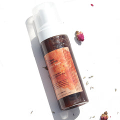 Close-up of rich black soap cleanser lathering in hand with creamy foam texture for oily, sensitive skin