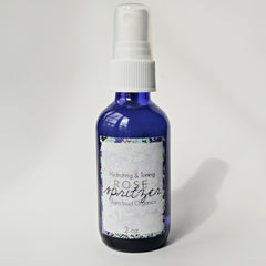 Toner spray bottle, blue glass with white spray top, JRaincloud Organics label