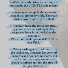 Close-up of Layla tattoo care cream in a sleek white tube with gold accents, showing rich texture on fingertips