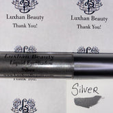Liquid Eyeshadow silver metallic tube with silver swatch, Luxhan Beauty brand