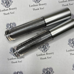 Liquid eyeshadow tubes with silver metallic caps and clear tubes, Luxhan Beauty brand