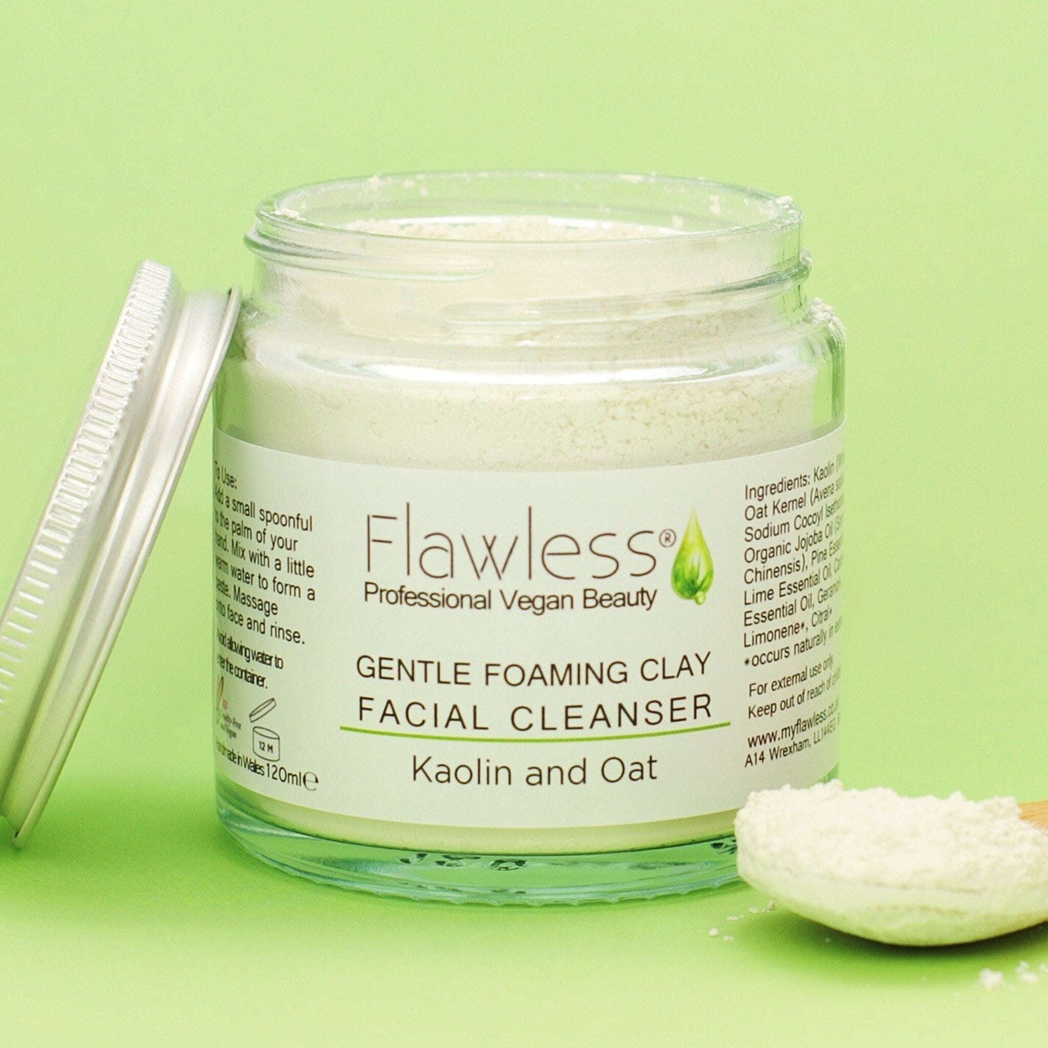 Facial Cleanser powder in clear glass jar with silver lid, Flawless branding visible