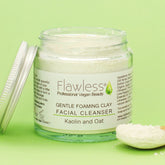 Facial Cleanser powder in clear glass jar with silver lid, Flawless branding visible
