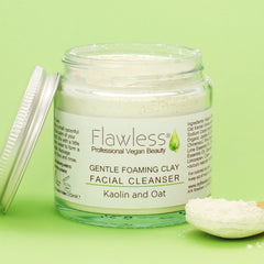 Facial Cleanser powder in clear glass jar with silver lid, Flawless branding visible