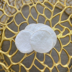 Reusable cotton pads, white terry cloth, round shape, in gold decorative bowl