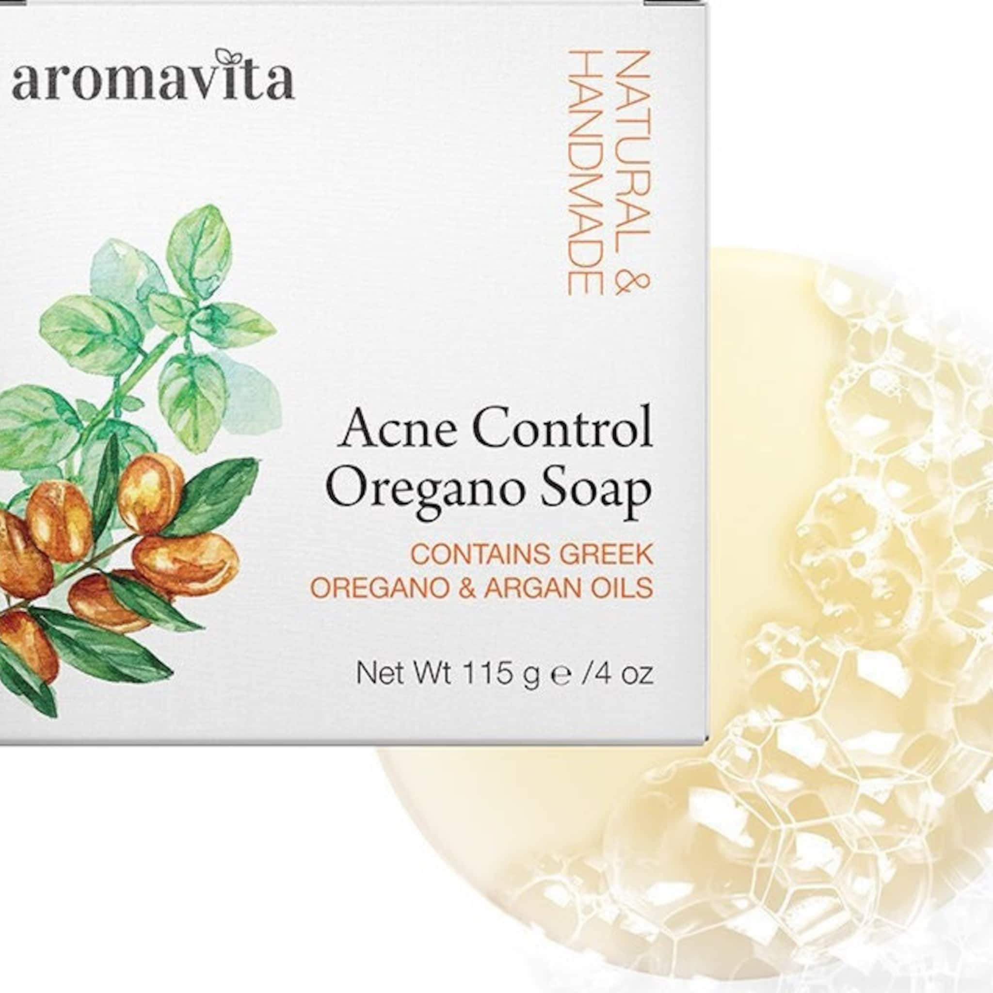 Acne control soap bar with Aromavita branding, white packaging, and yellow bubbles
