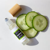 Cooling eye gel bottle with stainless roller ball, cucumber slices, and bamboo cap, Pickle's brand