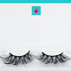False eyelashes, black wispy style, in clear plastic packaging