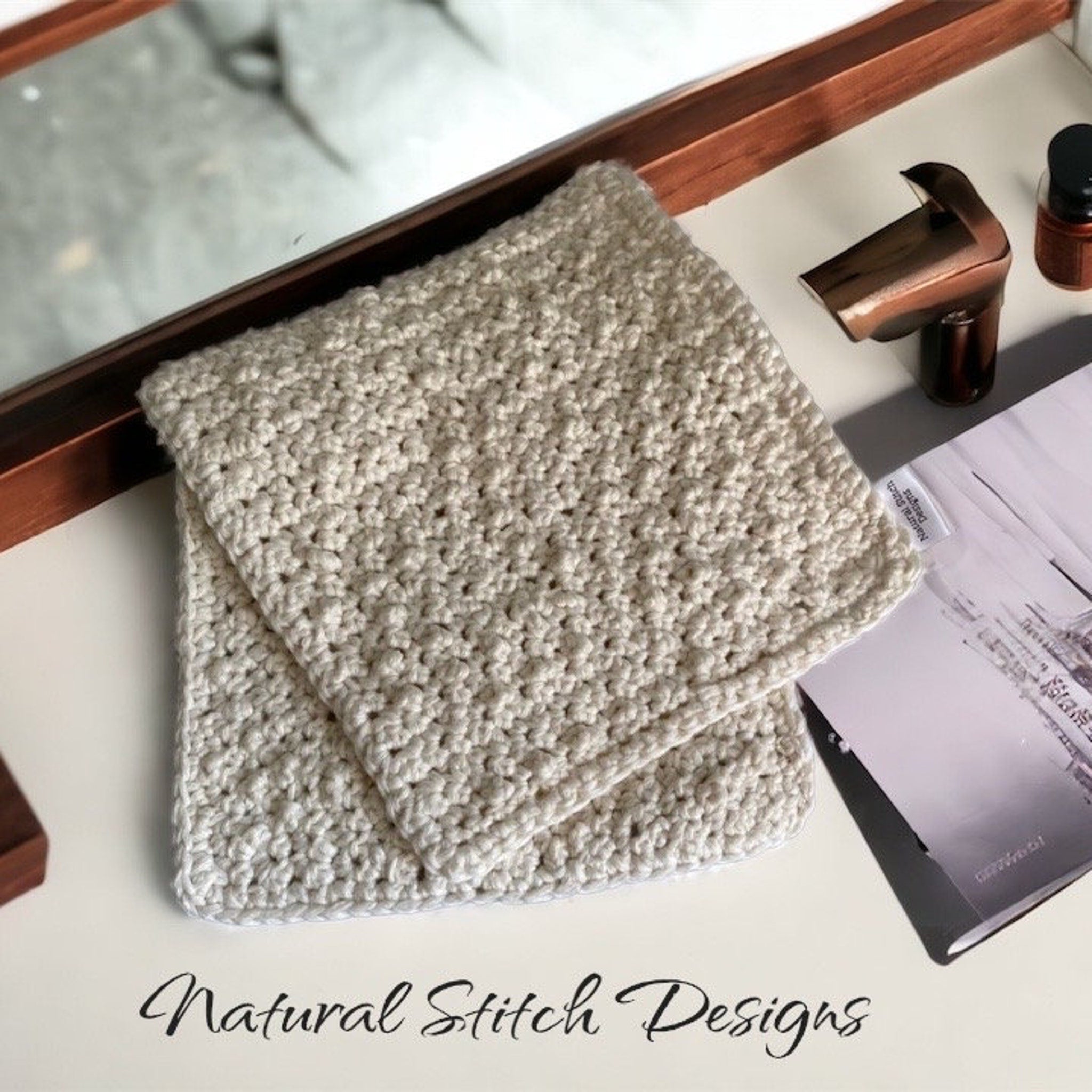 Washcloth, cream crochet cotton, folded, Natural Stitch Designs logo visible