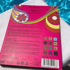 Eyeshadow palette with pink, floral design and REVOLUTION brand name visible