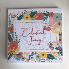 Eyeshadow palette floral print box with "Celestial Fairy" text and colorful flowers