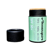 Mineral sun stick with black tube and green label, Oceanspire brand visible, SPF 30+