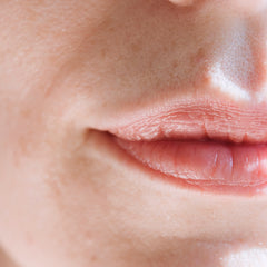Lips close-up, pink skin, textured lips, showing mouth detail