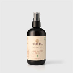 Tonic bottle with black glass, beige label, and spray top, BIOTERRA brand visible