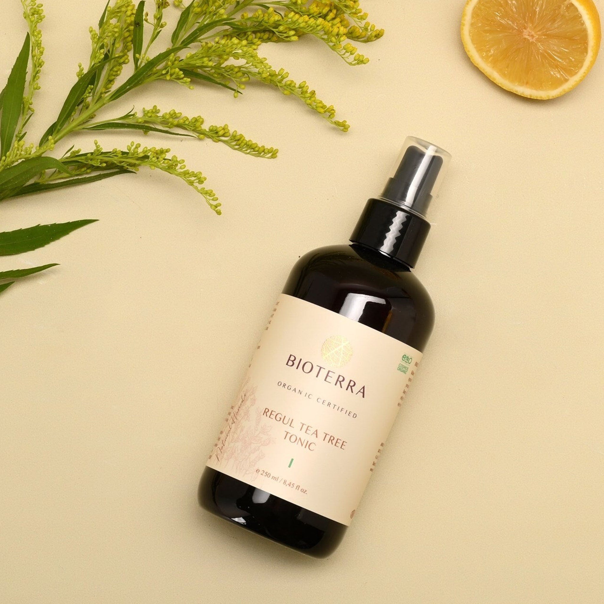 Facial toner bottle, dark brown glass, white label, Bioterra Organic brand