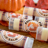 Pumpkin Pie Lip Balm tubes with plaid pattern and clear plastic, for lip care