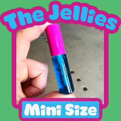 Blue liquid lip gloss with pink cap held by hand, CHLORA BELLA brand visible, mini size label
