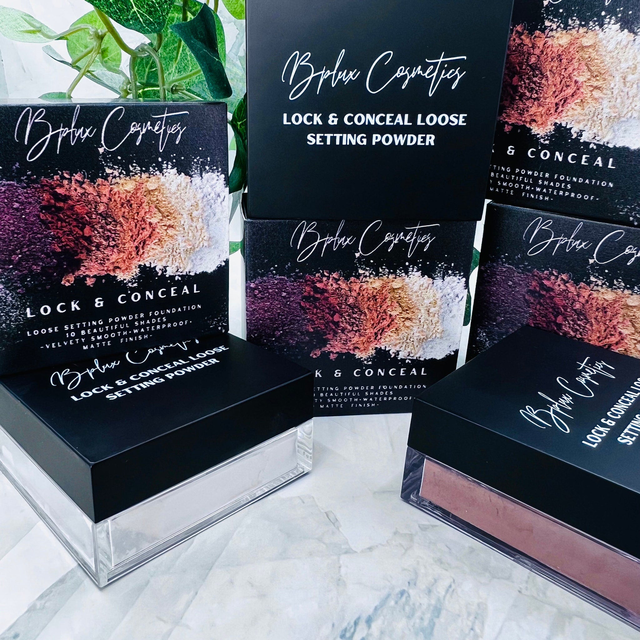 Loose setting powder with black boxes, white text, and BPLUX Cosmetics branding