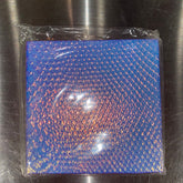 Square palette with nine vibrant eyeshadow pans in matte and shimmer finishes, arranged in three rows