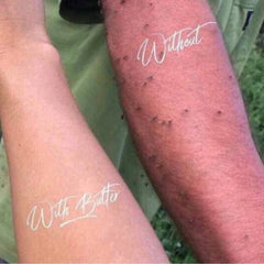 Side view of six white tubes of Epoch Body Butter with a tanner sample, showcasing smooth texture and minimalist packaging