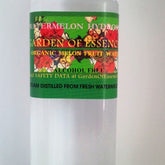 Toner bottle with green and red label, Garden of Essence text visible, for facial use