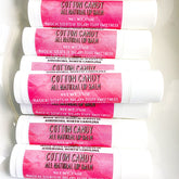 Lip balm tubes with pink label, white tube, Cotton Candy text visible
