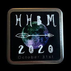 Square black tin with white text, moon graphic, and silver border, Halloween theme