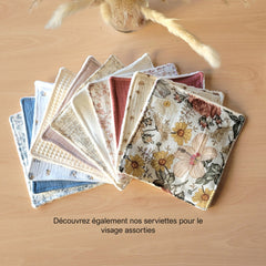 Stacked bamboo and cotton gauze wipes in neutral tones with eco-friendly packaging for gentle skincare routines