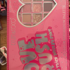 Eyeshadow palette with pink and silver accents, featuring "KEVIN & COCO" text and heart pattern