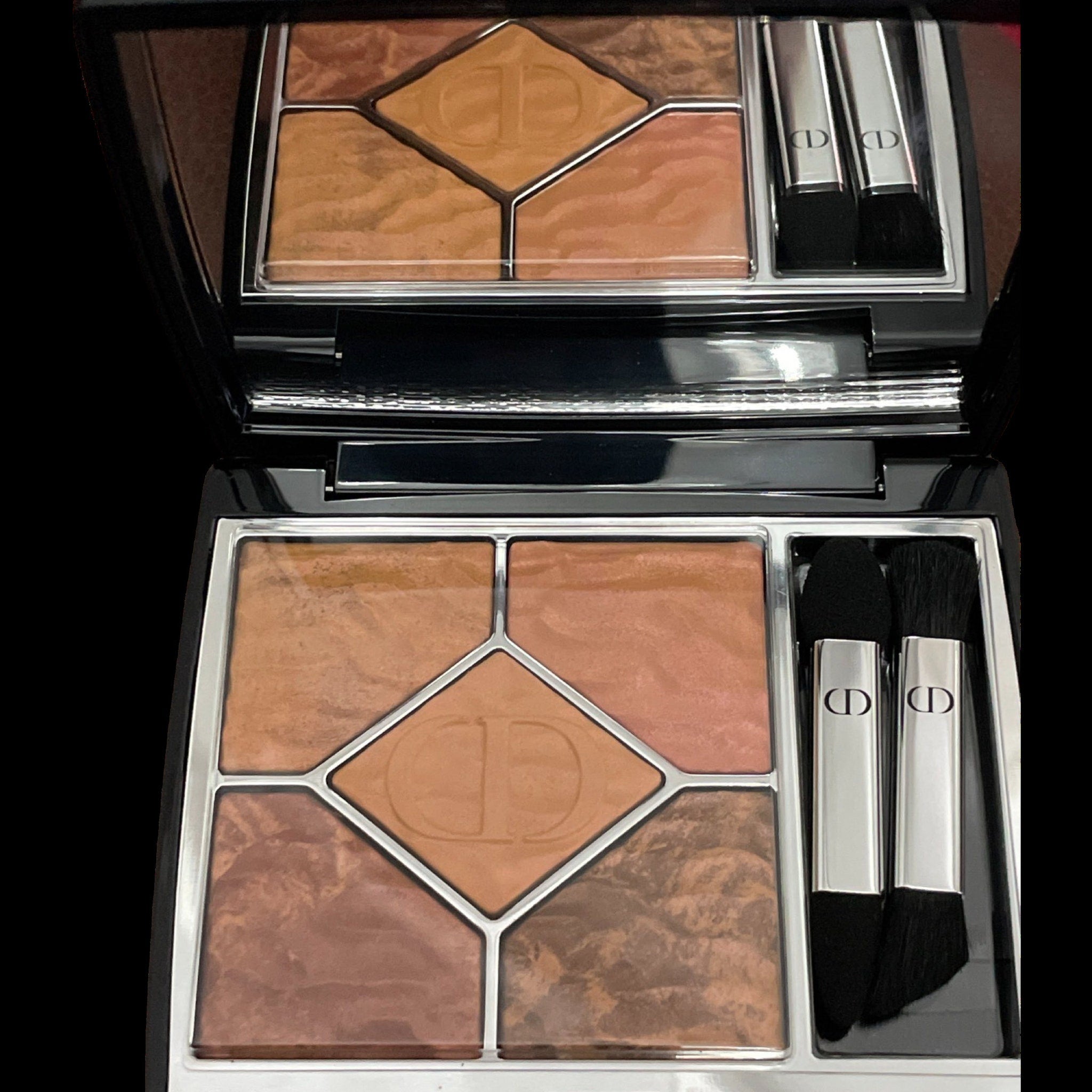 Dior eyeshadow palette featuring six vibrant new shades in matte and shimmer finishes with sleek black compact