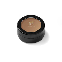 Eyeshadow compact with brown powder, black container, and BKSF logo