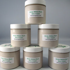 White Willow Bark Skin Cream, beige cream in clear jars with white lids, Brinaorganics.com label visible