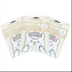 Face mask packets with llama illustration, floral crown, and "The Crème Shop" branding on beige background