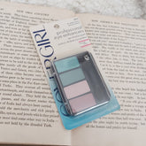 Cover Girl Vintage Eye Shadow Quad in Cool Watercolors 265 featuring four pastel shades in a sleek black compact