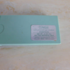 Clinique Soft Pressed Eye Shadow in teal with brand label on a light surface