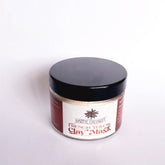 Clay mask jar with black lid, white label, and Happie Coconut branding