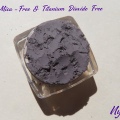 Eyeshadow pigment, matte medium gray, loose powder in clear container