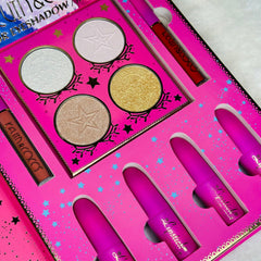 Makeup palette with pink, gold, and white eyeshadows, lipsticks, and brand name Keum & Coco visible on packaging