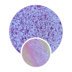 Pressed multichrome eyeshadow pan with shimmery duochrome finish shifting between vibrant hues