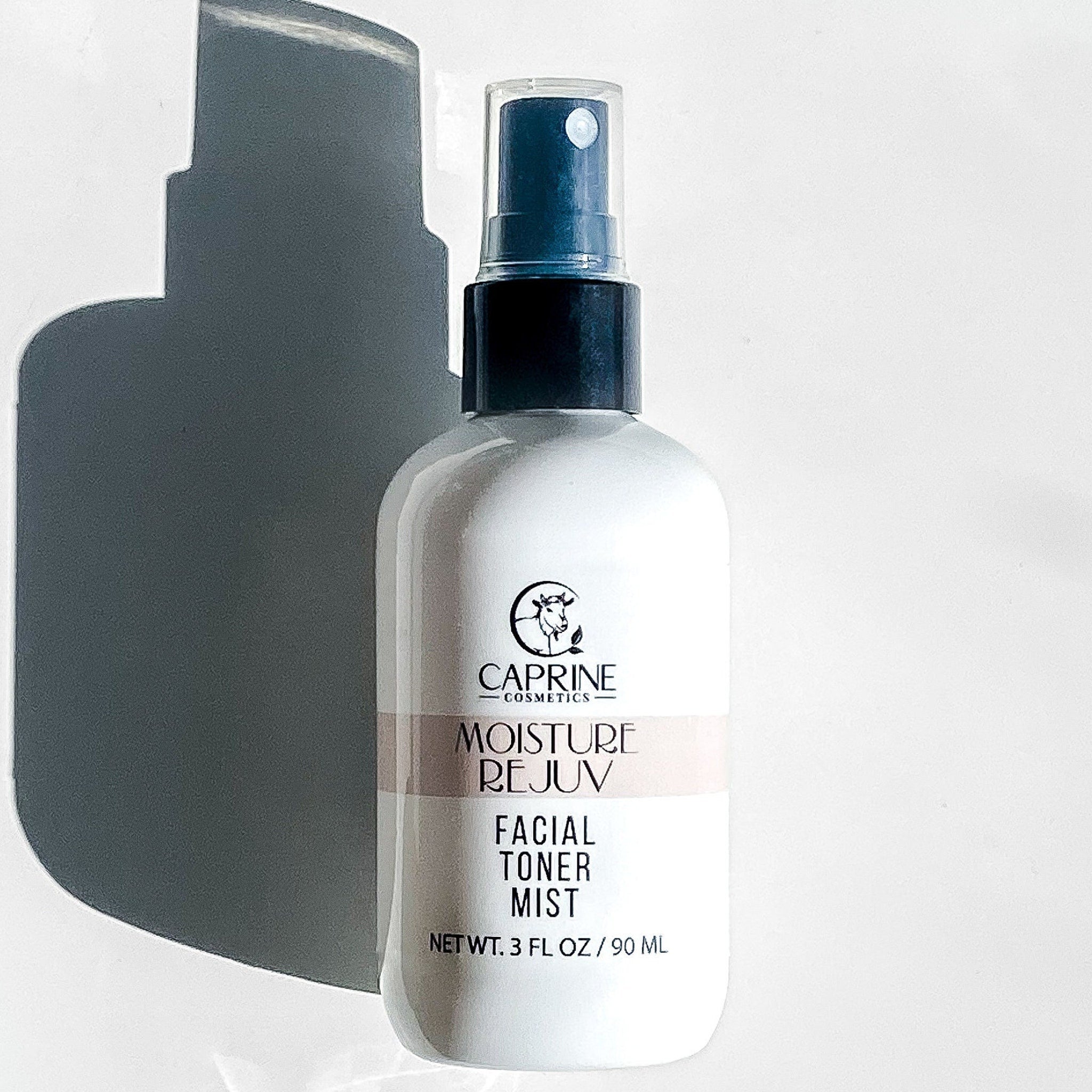 Facial toner mist bottle, white and black plastic, clear spray top, MOISTURE REJUV text