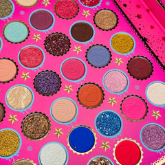 Eye shadow palette with pink, gold, and glitter colors, Kevin and Coco brand