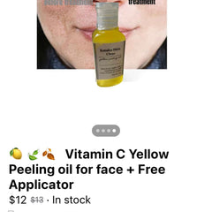 Side view of amber glass bottle with yellow peeling oil, showcasing free applicator beside it on marble surface