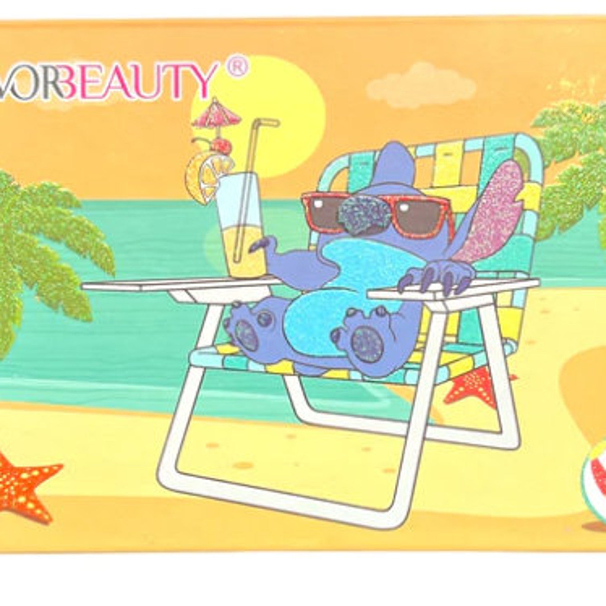 Open blue eyeshadow palette displaying 18 vibrant shades from navy to teal in matte and shimmer finishes